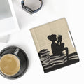 kwmobile Schutzhülle für Kobo Aura Edition 1 Hülle - eReader Flip Case mit Handschlaufe und Auto Sleep Funktion - Lesende Frau mit Schwarz Beige Schwarz  [dsg01]